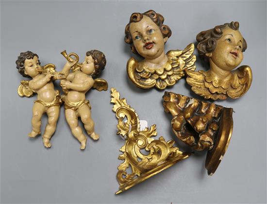 Four cherub appliques and two Italian gilt brackets